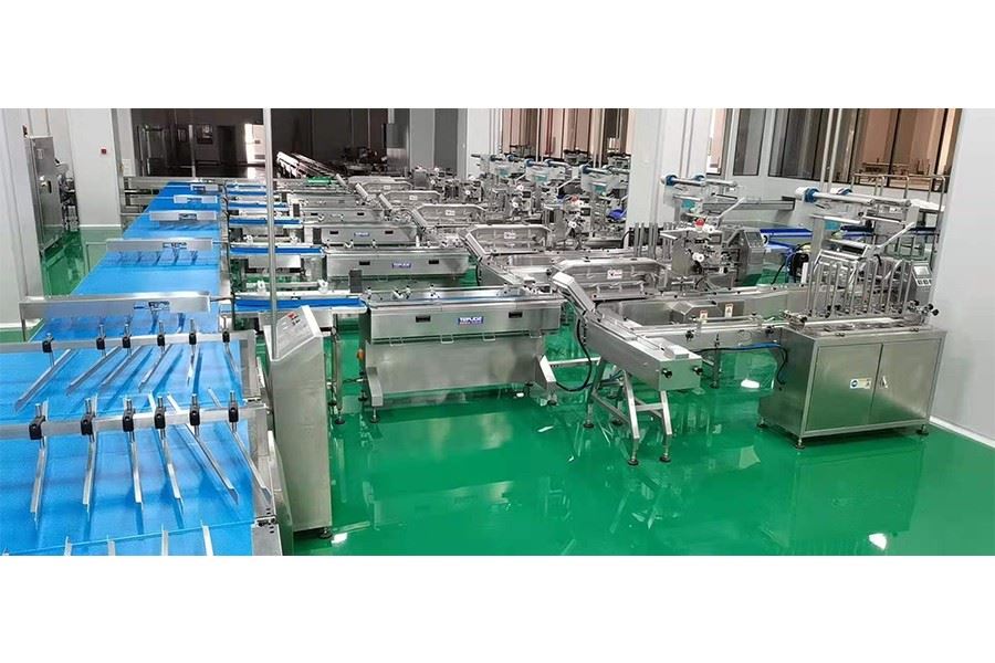 flower cake automatic feeding packaging line wafer packing line flow wrap manufacturer flower cake automatic feeding packaging line wafer packing line flow wrap manufacturer
