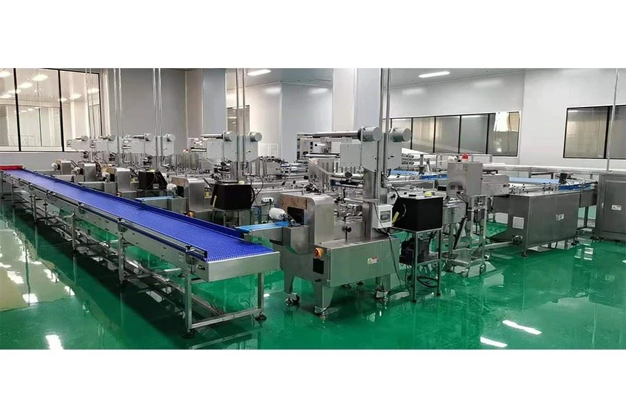 flower cake automatic feeding packaging line caramel treats automatic packing line machine manufacturer China supplier flower cake automatic feeding packaging line caramel treats automatic packing line machine manufacturer China supplier